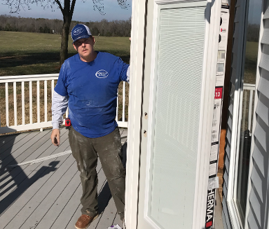 Man Beside a Door